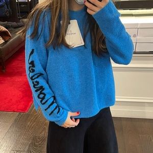 Bright blue moncler sweater, current season, moncler on sleeve